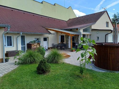 a house with a backyard with a patio at U kapličky, Boskovice in Boskovice