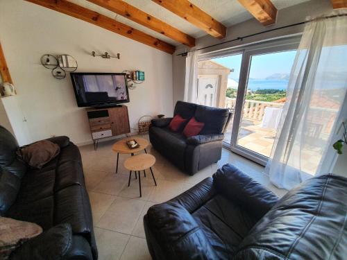 Apartments Villa Bell Memories- Two Bedroom Apartment with Shared Terrace and Sea View A5