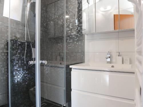 a bathroom with a glass shower and a sink at Apartment Tonka - Two Bedroom Apartment - ST in Supetar