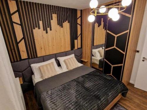 En eller flere senge i et værelse på Urban Luxury Apartment Zagreb