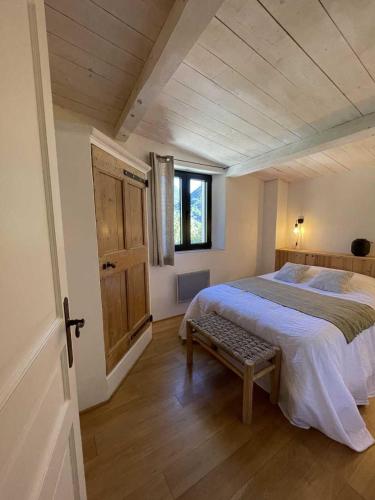 Katil atau katil-katil dalam bilik di Les Demeures Azélie & SPA