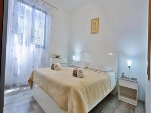 Postel nebo postele na pokoji v ubytování Apartments Lenka - One Bedroom Apartment with Balcony and Center View A3