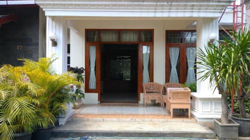 Eine Fassade oder ein Eingang zu Purikafilla Homestay