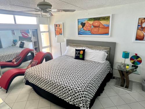 Ένα ή περισσότερα κρεβάτια σε δωμάτιο στο Private Apartment at Maré St Clair Hotel