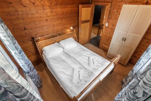 Katil atau katil-katil dalam bilik di Charmant logement familial à Euseigne