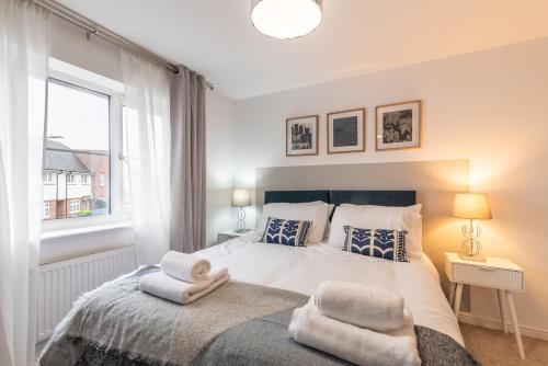 Ένα ή περισσότερα κρεβάτια σε δωμάτιο στο Prime location 3 bed House