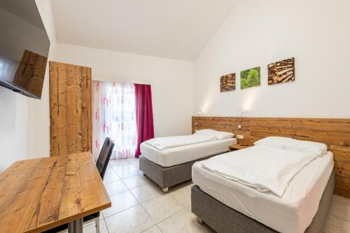 Postel nebo postele na pokoji v ubytování Apartment´s Marchtrenk