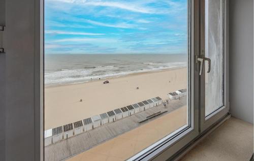 a window with a view of the beach at Residentie Aurore Ref 208 in Ostend