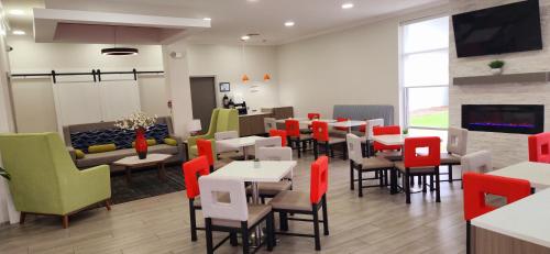 TV o dispositivi per l'intrattenimento presso Americas Best Value Inn & Suites-Foley