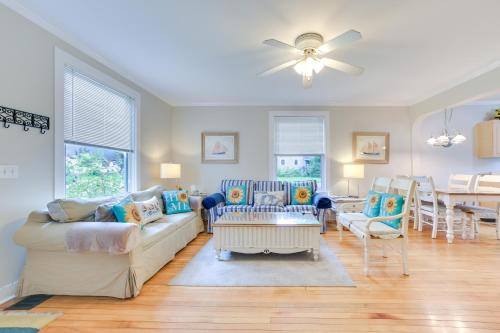 a living room with a couch and chairs and a table at Walk to Lake Michigan Pet-Friendly Charlevoix Gem in Charlevoix
