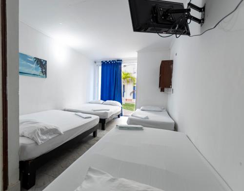 Postel nebo postele na pokoji v ubytování Hotel Be Real
