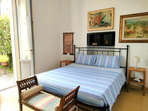Postel nebo postele na pokoji v ubytování Villa Scalabrini