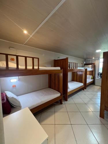 Postel nebo postele na pokoji v ubytování Hostel Da Jô