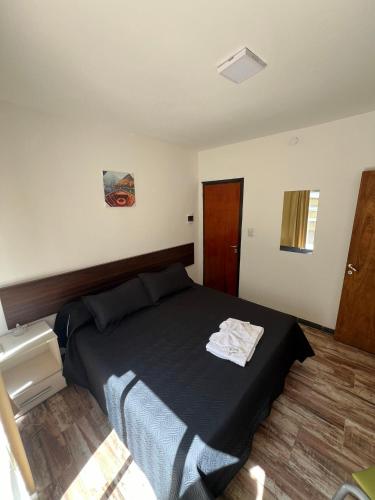 Una cama o camas en una habitación de Complejo Roccatini