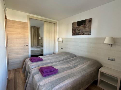 Postel nebo postele na pokoji v ubytování Apartsalou Michelangelo
