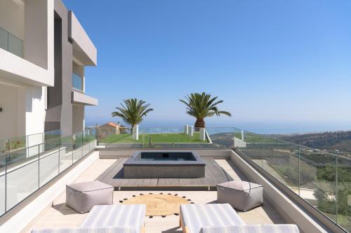 a balcony with a view of a building at Villa Kalliston in Rethymno Town