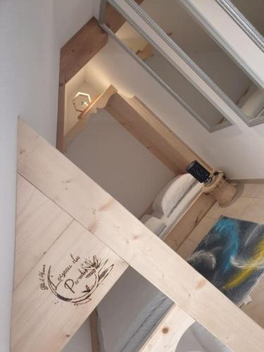 Postel nebo postele na pokoji v ubytování Gîte l'Oiseau du Paradis - Appartement moderne au cœur de l'Alsace