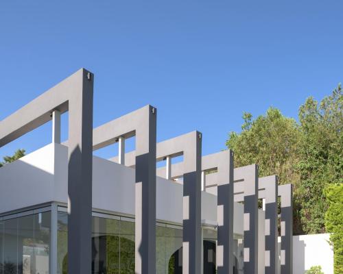 an architectural rendering of a glass building with trees in the background at Villa Kalliston in Rethymno Town