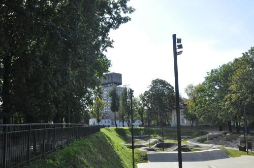 a park with skate ramps and a street light at Prestige Apartment in Narva
