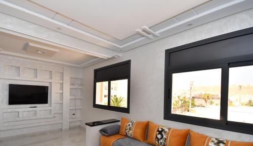 TV a/nebo společenská místnost v ubytování Appartement Saloua ino