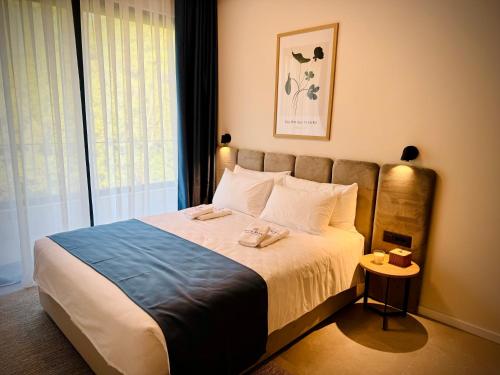 Katil atau katil-katil dalam bilik di Royal Blue Resort & Residences