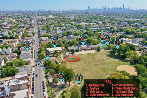 an aerial view of a city with a bunch of signs at Stylish & Bright Gem Overlooks Lovely Park with Great Amenities in Chicago