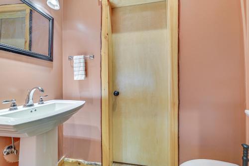 a bathroom with a sink and a shower at Chestertown Retreat with Fire Pit, Near Gore Mtn! in Chestertown
