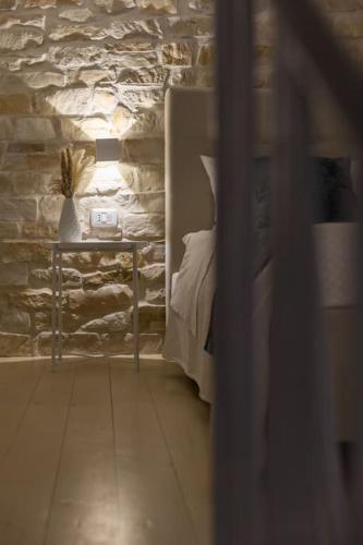 Postel nebo postele na pokoji v ubytování Centro Storico Sciacca - Casa Di Pisa Cortile Termine
