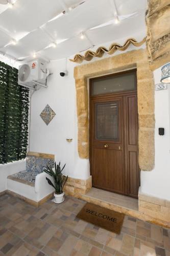 Posezení v ubytování Centro Storico Sciacca - Casa Di Pisa Cortile Termine