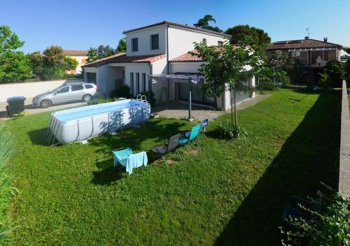 Maison Spacieuse Climatisée avec Jardin 2 PKG et Piscine