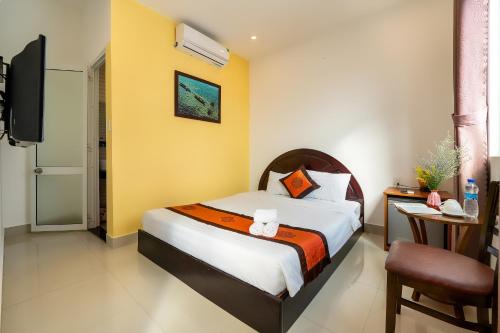 Ένα ή περισσότερα κρεβάτια σε δωμάτιο στο Sam Sam Homestay