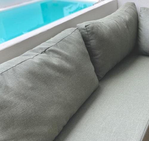 a close up of a couch on a boat at Kasa Koh in Brisas de Zicatela