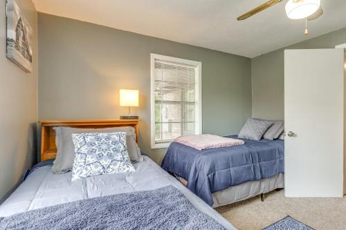 a bedroom with two beds and a window at Harrison Getaway with Yard and Parking Near Fishing in Harrison