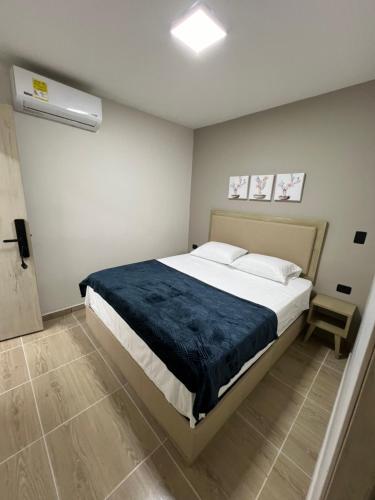 Postel nebo postele na pokoji v ubytování Laureles Inn