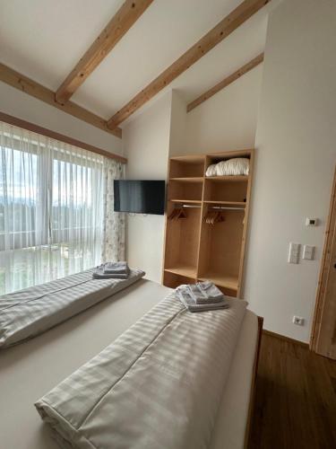 Postel nebo postele na pokoji v ubytování Appartement Weitblick