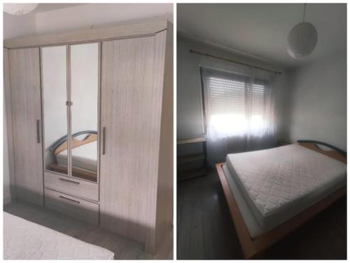 - une chambre avec un lit et une armoire avec un miroir dans l'établissement F2 collé Bale Basel poste frontiere et tramway Novartis, à Saint-Louis