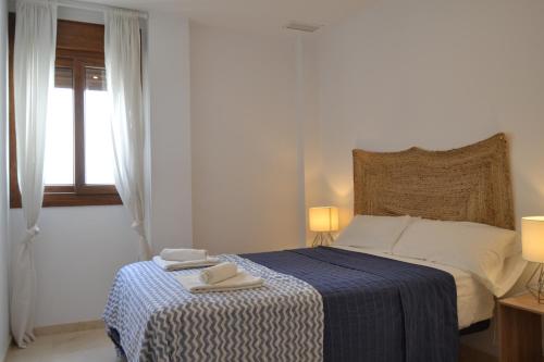 Ένα ή περισσότερα κρεβάτια σε δωμάτιο στο Penthouse City Center - Jerez