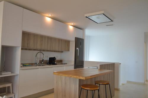 Η κουζίνα ή μικρή κουζίνα στο Penthouse City Center - Jerez