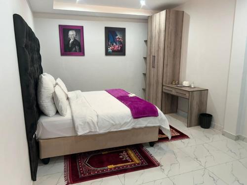 Кровать или кровати в номере Mineheart Boutique Hotel
