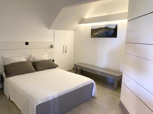 Postel nebo postele na pokoji v ubytování Suite Relax & Business FDF