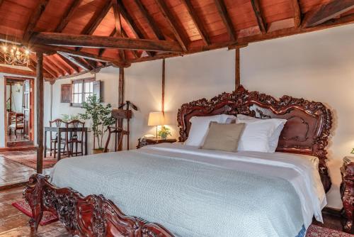 Ένα ή περισσότερα κρεβάτια σε δωμάτιο στο TIZÓN Suites