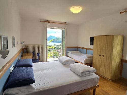Una cama o camas en una habitación de Hotel Miramonti