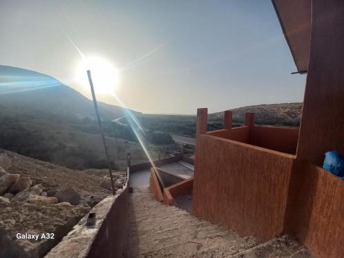 a view from the top of a building with the sun shining at BananaHouse in Tamri