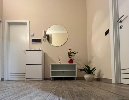 a dressing room with a mirror and a dresser at Casa di Carmignanello in Cantagallo