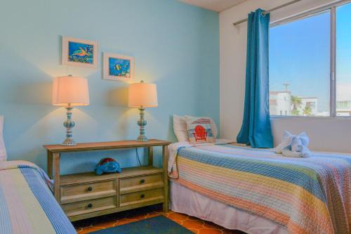 Postel nebo postele na pokoji v ubytování Las Mareas #21