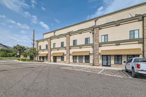 an empty parking lot in front of a building at Golden Getaway Spacious 2BR Walk to Trails in Golden