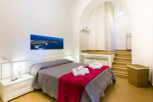 Tempat tidur dalam kamar di Le Case Di Rosella
