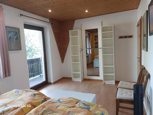 Ένα ή περισσότερα κρεβάτια σε δωμάτιο στο Atelier le Camp