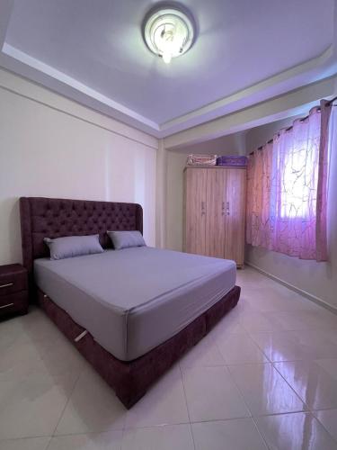 Ένα ή περισσότερα κρεβάτια σε δωμάτιο στο Appartement Haut Standing en Plein Coeur de la Ville