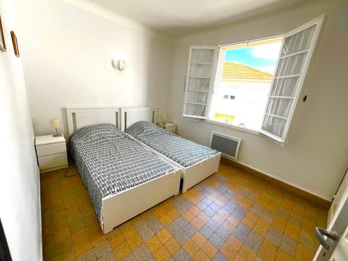 Postel nebo postele na pokoji v ubytování Villa Cantarela, Palavas plage, Vue mer